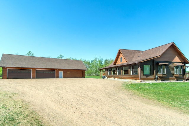 24341 Bluebird Ave, Trommald, MN 56441 - view of front of property with a detached garage, driveway, an outdoor structure, and crawl space