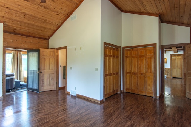 24341 Bluebird Ave, Trommald, MN 56441 - unfurnished bedroom with high vaulted ceiling, dark wood-type flooring, wooden ceiling, two closets, and access to exterior
