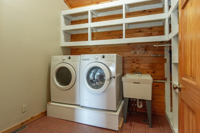 24341 Bluebird Ave, Trommald, MN 56441 - laundry area with washer and dryer and baseboards