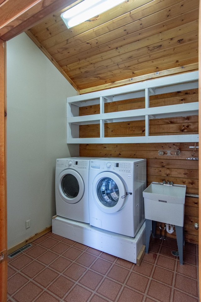 24341 Bluebird Ave, Trommald, MN 56441 - laundry room featuring washing machine and clothes dryer and wood ceiling
