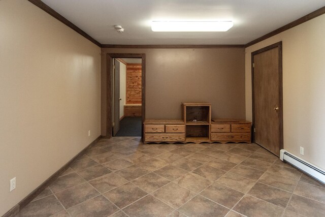 24341 Bluebird Ave, Trommald, MN 56441 - tiled empty room featuring baseboard heating and ornamental molding