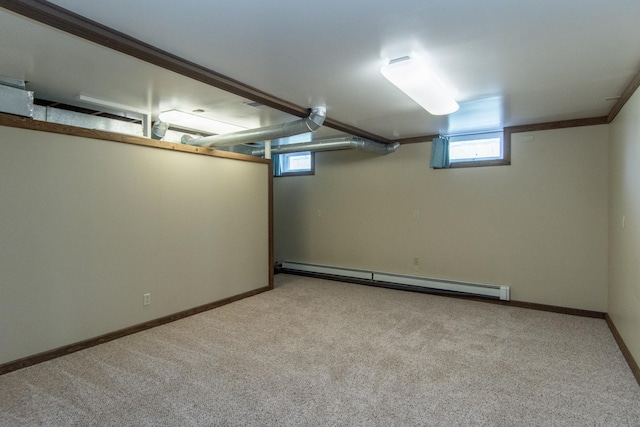 24341 Bluebird Ave, Trommald, MN 56441 - below grade area with a baseboard heating unit, light colored carpet, and healthy amount of natural light