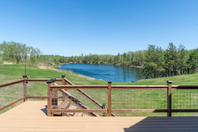 24341 Bluebird Ave, Trommald, MN 56441 - wooden terrace with a water view, a yard, and a view of trees