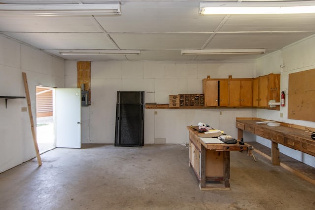 24341 Bluebird Ave, Trommald, MN 56441 - garage with electric panel and a workshop area