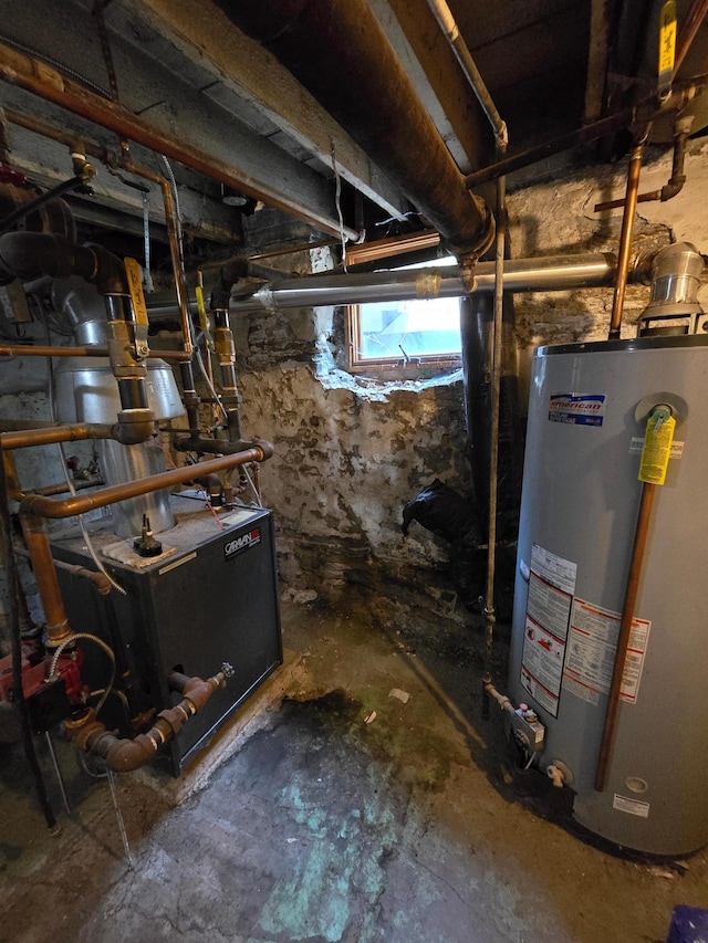 below grade area with gas water heater and a heating unit