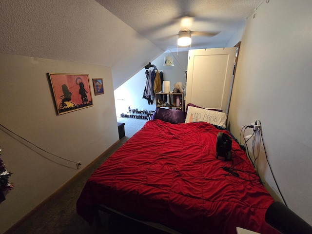 bedroom featuring carpet flooring, ceiling fan, a textured ceiling, and lofted ceiling