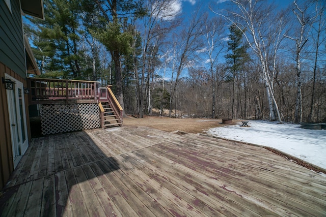 view of snow covered deck