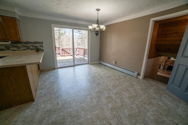 unfurnished dining area with baseboards, a baseboard heating unit, an inviting chandelier, a fireplace, and light floors