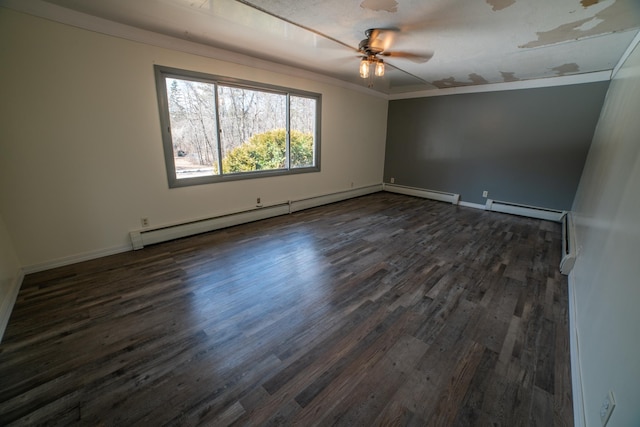 spare room featuring a baseboard radiator, ceiling fan, and dark wood-style floors