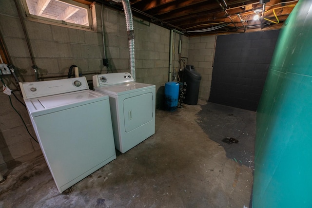 laundry area with washer and clothes dryer and laundry area