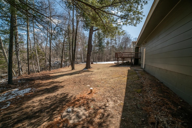 view of yard with a deck
