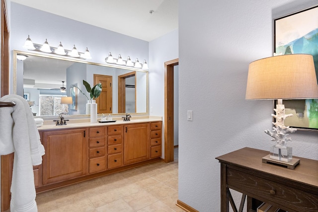 7100 Metro Blvd Unit 206, Edina, MN 55439 - bathroom with double vanity, a sink, and tile patterned floors