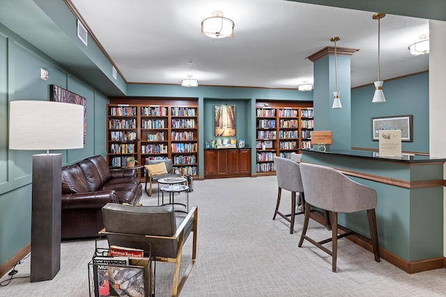 7100 Metro Blvd Unit 206, Edina, MN 55439 - interior space with baseboards, ornamental molding, bookshelves, and visible vents