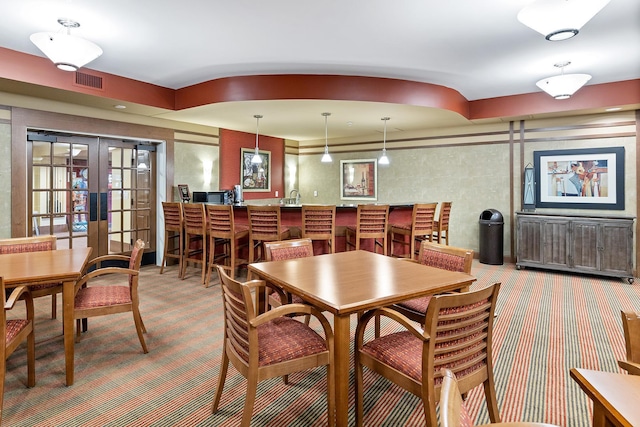 7100 Metro Blvd Unit 206, Edina, MN 55439 - dining area with visible vents, french doors, and carpet