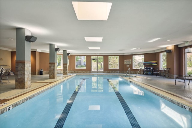 7100 Metro Blvd Unit 206, Edina, MN 55439 - pool featuring a skylight