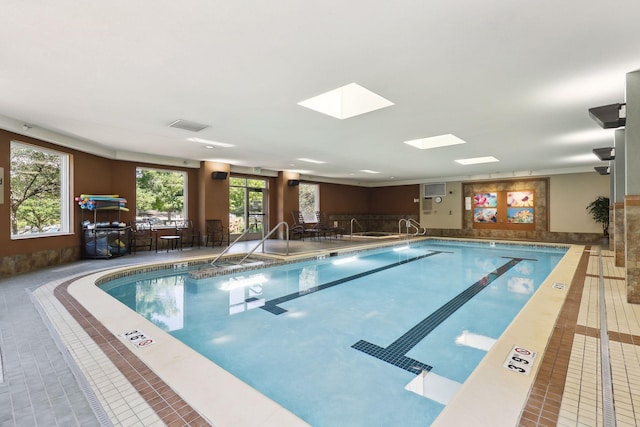 7100 Metro Blvd Unit 206, Edina, MN 55439 - pool featuring a skylight