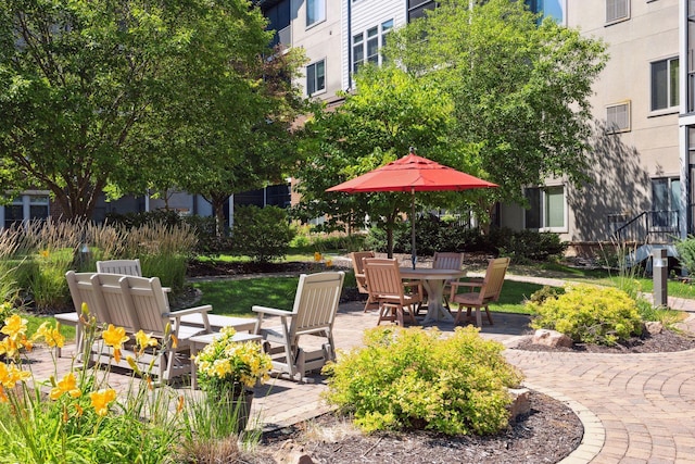 7100 Metro Blvd Unit 206, Edina, MN 55439 - view of patio / terrace featuring outdoor dining area
