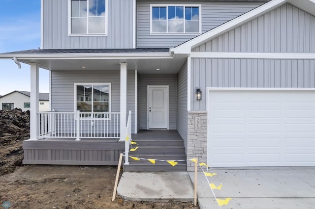 3187 Archer Pl S, Fargo, ND 58104 - entrance to property with covered porch and board and batten siding