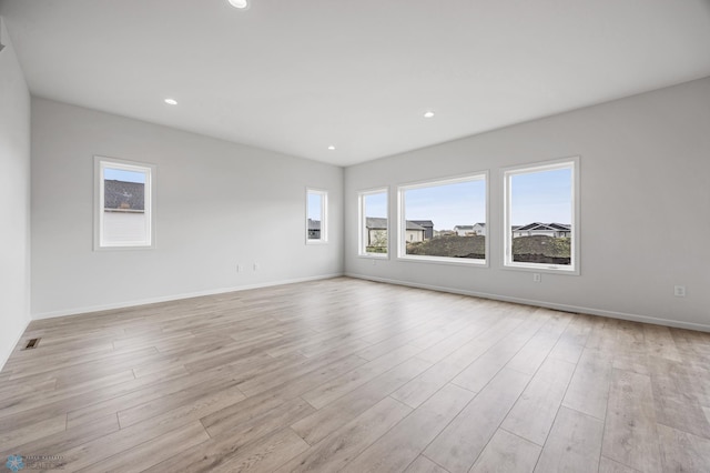 3187 Archer Pl S, Fargo, ND 58104 - empty room with light wood finished floors, baseboards, and recessed lighting