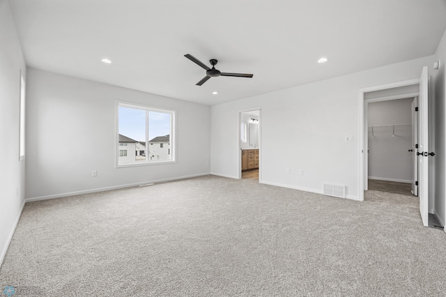 3187 Archer Pl S, Fargo, ND 58104 - unfurnished bedroom featuring carpet floors, a walk in closet, baseboards, recessed lighting, and ceiling fan