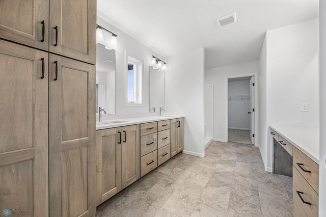 3187 Archer Pl S, Fargo, ND 58104 - full bath featuring baseboards, double vanity, and a spacious closet