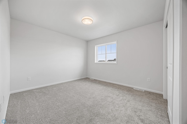 3187 Archer Pl S, Fargo, ND 58104 - carpeted empty room featuring baseboards