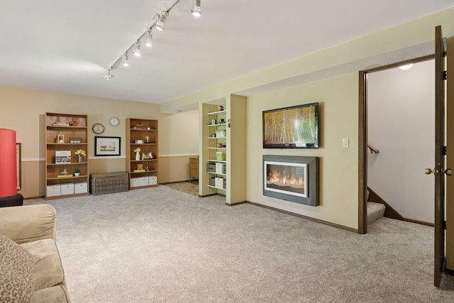 1794 Karis Way, Eagan, MN 55122 - living room with a glass covered fireplace, stairs, carpet flooring, and track lighting