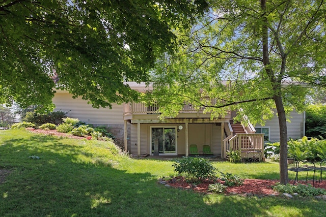 1794 Karis Way, Eagan, MN 55122 - rear view of property with stairway, a lawn, and a wooden deck
