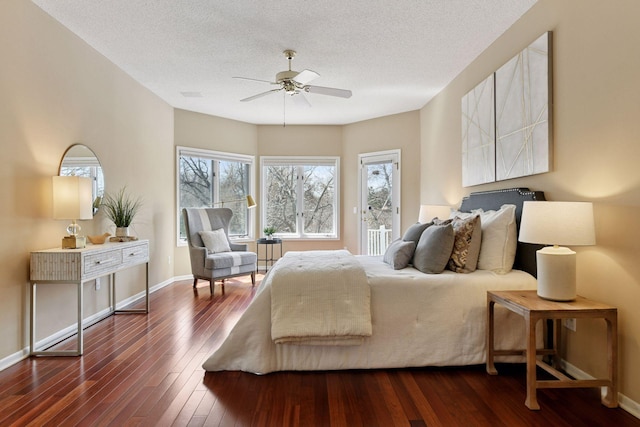 7604 Delaney Blvd, Edina, MN 55439 - bedroom with access to exterior, dark wood-style floors, and baseboards