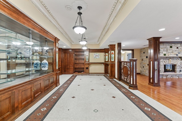 7604 Delaney Blvd, Edina, MN 55439 - hallway featuring ornamental molding, wood finished floors, and a tray ceiling