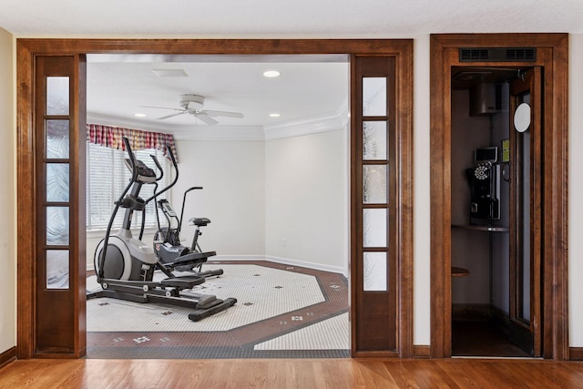 7604 Delaney Blvd, Edina, MN 55439 - workout area featuring wood finished floors, ceiling fan, visible vents, and baseboards
