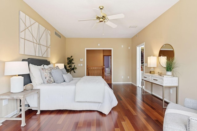 7604 Delaney Blvd, Edina, MN 55439 - bedroom with dark wood finished floors, ceiling fan, and ensuite bathroom