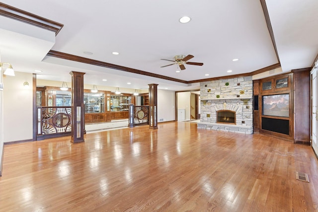 7604 Delaney Blvd, Edina, MN 55439 - unfurnished living room with ornamental molding, a ceiling fan, recessed lighting, a fireplace, and wood finished floors