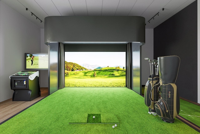 7604 Delaney Blvd, Edina, MN 55439 - playroom with rail lighting, a mountain view, wood finished floors, and golf simulator