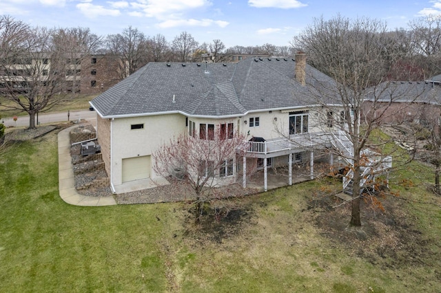7604 Delaney Blvd, Edina, MN 55439 - back of property featuring a chimney, stucco siding, a shingled roof, a deck, and a lawn