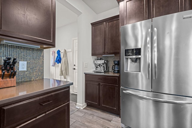 5836 Radford Ave NE, Otsego, MN 55374 - kitchen featuring light wood-style flooring, dark brown cabinetry, backsplash, and stainless steel fridge with ice dispenser