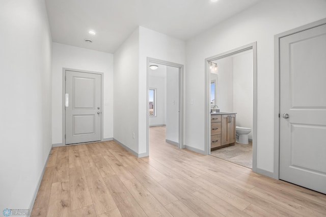 10218 73rd St S, Horace, ND 58047 - interior space featuring recessed lighting, light wood-style floors, and baseboards