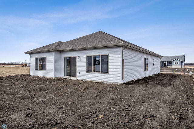 10218 73rd St S, Horace, ND 58047 - back of house with a shingled roof