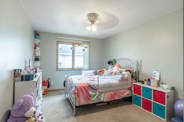 bedroom with carpet floors and a ceiling fan