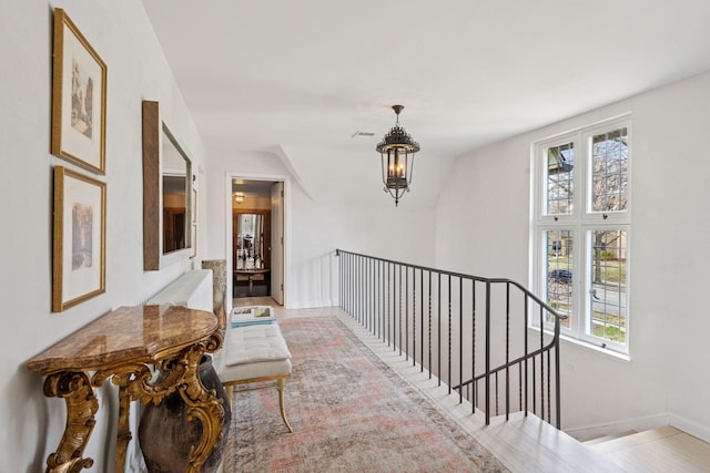 4232 Fremont Ave S, Minneapolis, MN 55409 - corridor featuring healthy amount of natural light and an upstairs landing
