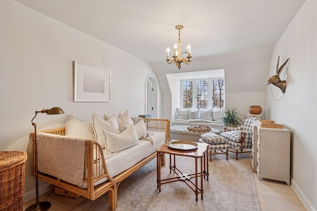 4232 Fremont Ave S, Minneapolis, MN 55409 - living room with a chandelier and light wood-style floors