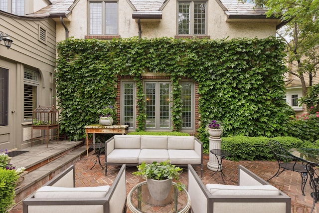 4232 Fremont Ave S, Minneapolis, MN 55409 - view of patio featuring an outdoor hangout area and french doors