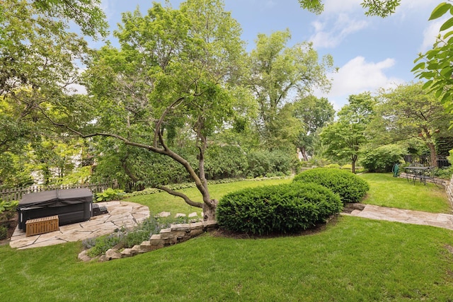 4232 Fremont Ave S, Minneapolis, MN 55409 - view of yard featuring a patio area, view of scattered trees, and a hot tub