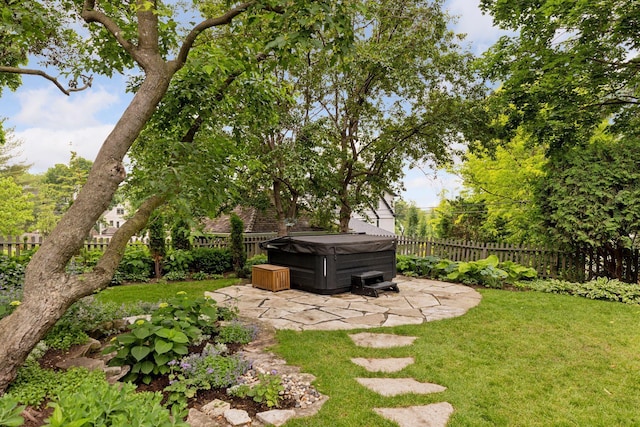 4232 Fremont Ave S, Minneapolis, MN 55409 - fenced backyard with a hot tub and a patio
