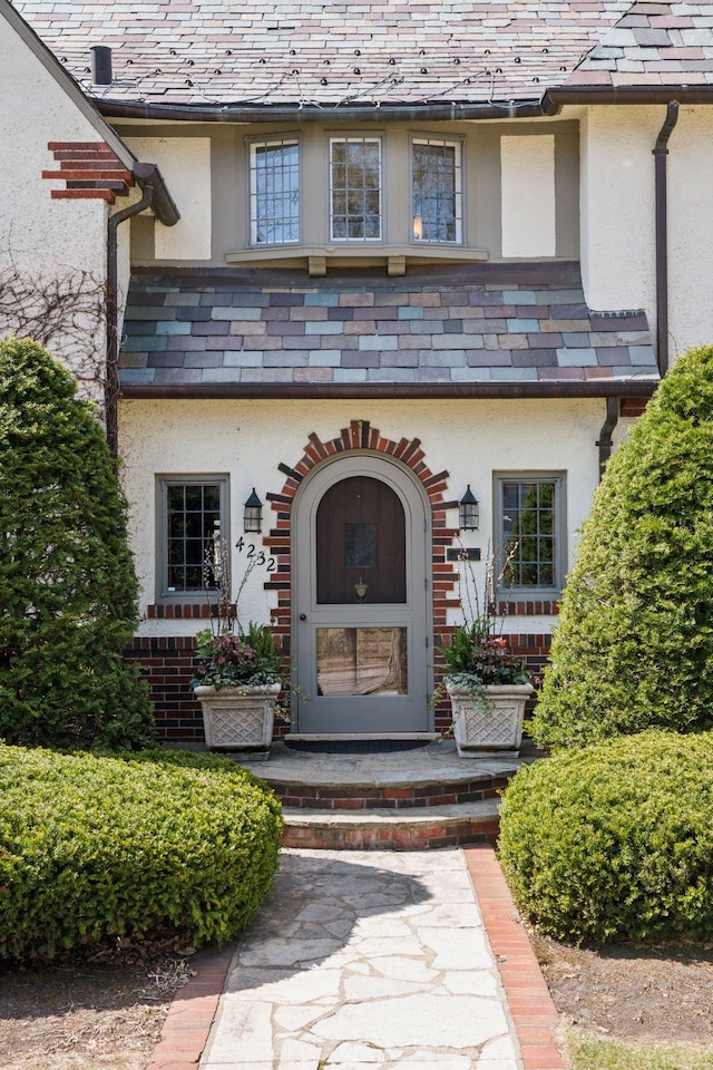 4232 Fremont Ave S, Minneapolis, MN 55409 - entrance to property with a high end roof and stucco siding