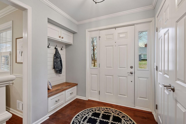 mudroom with crown molding, baseboards, dark wood-style floors, and visible vents