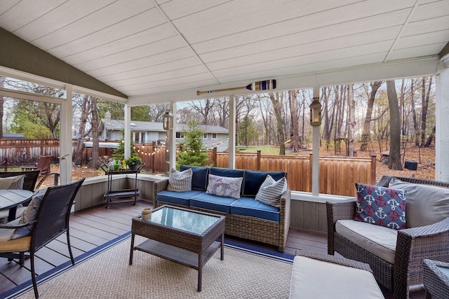 sunroom / solarium with an outdoor living space