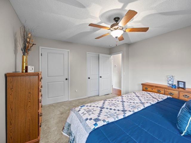 26635 Variolite St NW, Stanford Twp, MN 55070 - bedroom with light carpet, a ceiling fan, and a textured ceiling