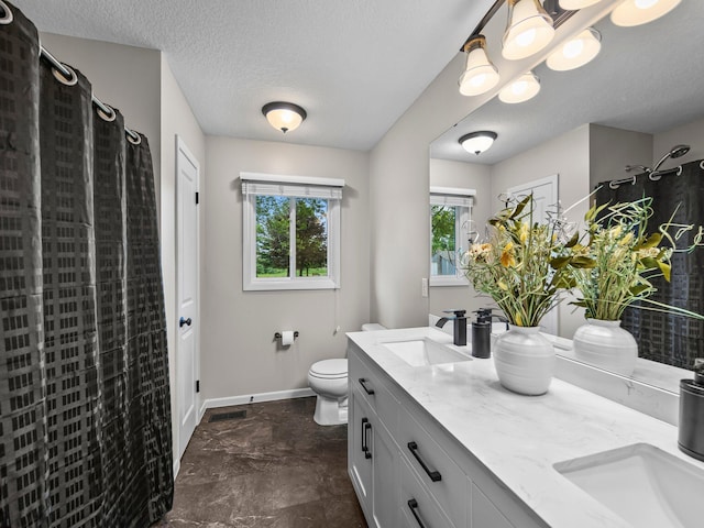 26635 Variolite St NW, Stanford Twp, MN 55070 - full bathroom with double vanity, a textured ceiling, and a shower with shower curtain