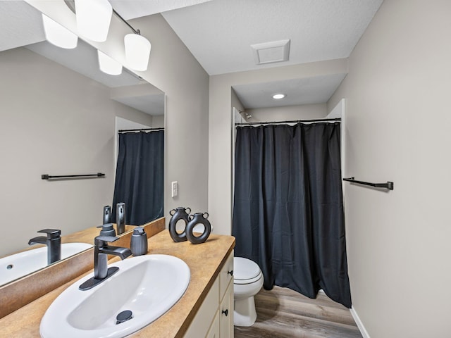 26635 Variolite St NW, Stanford Twp, MN 55070 - full bath featuring wood finished floors, vanity, and a shower with curtain